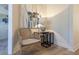 Hallway nook with a cozy chair and unique sea turtle artwork at 109 Carolina Blvd, Isle of Palms, SC 29451
