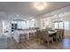 Bright kitchen and dining area with stainless steel appliances and island seating at 109 Carolina Blvd, Isle of Palms, SC 29451
