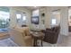 Charming living room filled with comfortable seating, built in shelves, and adjacent bedroom view at 109 Carolina Blvd, Isle of Palms, SC 29451