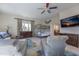 Comfortable room with twin bunk beds and colorful ceiling fan at 109 Carolina Blvd, Isle of Palms, SC 29451