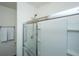 Clean bathroom featuring a glass-enclosed shower with a shower head and a sliding glass door at 109 Lyra Ln, Summerville, SC 29486