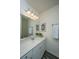 Clean bathroom featuring a white vanity with countertop, a large mirror and modern lighting at 109 Lyra Ln, Summerville, SC 29486
