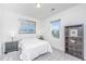 Bright bedroom featuring a comfortable bed, stylish decor, and ample natural light from the window at 109 Lyra Ln, Summerville, SC 29486