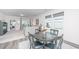 Bright living room featuring hardwood floors, recessed lighting and a smooth transition to the dining area at 109 Lyra Ln, Summerville, SC 29486