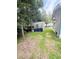 Backyard featuring a storage shed next to the home at 1124 Davidson Ave, Charleston, SC 29407