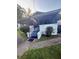 Inviting single story home featuring a screened porch and well-maintained lawn at 1124 Davidson Ave, Charleston, SC 29407