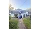Charming single story home with screened in porch and lush green front lawn at 1124 Davidson Ave, Charleston, SC 29407