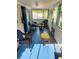 Relaxing screened in porch with furniture at 1124 Davidson Ave, Charleston, SC 29407