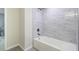 A bathroom featuring a bath tub with white subway tile at 1525 Westmoreland Ave, Charleston, SC 29412