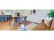Cozy dining area with hardwood floors, modern furnishings, and natural light, adjacent to the kitchen at 1525 Westmoreland Ave, Charleston, SC 29412
