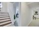A home's entry featuring stairs, and view into a carpeted room at 1525 Westmoreland Ave, Charleston, SC 29412