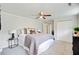 Spacious main bedroom with a ceiling fan, carpeting, and a neutral color scheme at 1525 Westmoreland Ave, Charleston, SC 29412