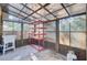 Bright sun room with shelving, sink, and windows providing ample natural light at 1525 Westmoreland Ave, Charleston, SC 29412