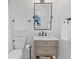 Bathroom with vanity and marble countertop, featuring modern fixtures and a view of an adjacent living space at 1530 Willtown St, Daniel Island, SC 29492