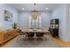 Dining room with unique chandelier and hardwood floors at 1530 Willtown St, Daniel Island, SC 29492