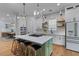 Modern kitchen featuring a large island with seating, stainless steel appliances, and ample counter space at 1530 Willtown St, Daniel Island, SC 29492