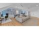 Spacious living room featuring foosball table, a large couch, and a wall lined with display cases at 1530 Willtown St, Daniel Island, SC 29492