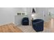 Bright loft area with seating, perfect for reading or relaxing at 1530 Willtown St, Daniel Island, SC 29492
