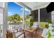 Cozy porch with comfortable seating offering views of the surrounding landscape at 1530 Willtown St, Daniel Island, SC 29492