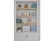 Stylishly decorated built-in shelves with books and decorative items enhance the room's aesthetic at 1530 Willtown St, Daniel Island, SC 29492