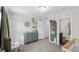 Bedroom featuring a crib, changing table, and two entry ways at 1543 Bluewater Way, Charleston, SC 29414