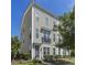 Charming townhome featuring neutral siding, a small balcony, and well-maintained landscaping at 1543 Bluewater Way, Charleston, SC 29414