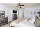 The main bedroom offers a ceiling fan, neutral walls, tv, and two dressers at 1543 Bluewater Way, Charleston, SC 29414