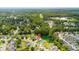 Lush aerial view highlighting a neighborhood surrounding a pond, identified with a location pin at 158 Balsam Cir, Summerville, SC 29485