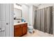 Compact bathroom with a vanity, large mirror, toilet and a shower with curtain at 158 Balsam Cir, Summerville, SC 29485