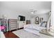 Primary bedroom with a bed, rug, dresser and an exterior window that provides natural light at 158 Balsam Cir, Summerville, SC 29485