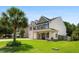 Well-maintained home with a spacious front yard and a covered front porch at 158 Balsam Cir, Summerville, SC 29485