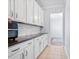 Modern kitchen features sleek cabinets, granite countertops, and a stylish tile backsplash at 158 Balsam Cir, Summerville, SC 29485