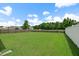 This expansive backyard is surrounded by a privacy fence at 158 Netherfield Dr, Summerville, SC 29486