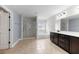 Large primary bath featuring a glass shower, soaking tub, and double sink vanity at 158 Netherfield Dr, Summerville, SC 29486
