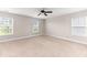 A vacant bedroom featuring a ceiling fan and two windows at 158 Netherfield Dr, Summerville, SC 29486