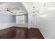 Open-concept living area with hardwood floors, wainscoting, coffered ceilings, and natural light at 158 Netherfield Dr, Summerville, SC 29486