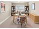 Well appointed office with decorative shelves, contemporary desk, and carpet flooring at 158 Netherfield Dr, Summerville, SC 29486