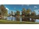 Scenic pond with a fountain and lush greenery, offering a tranquil setting for relaxation at 158 Netherfield Dr, Summerville, SC 29486