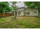 Spacious back yard of home with fenced yard and partial view of the back patio at 1629 Jorrington Street St, Mount Pleasant, SC 29466