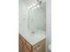 Bright bathroom featuring a vanity with a white countertop and a large mirror with Hollywood lighting at 1629 Jorrington Street St, Mount Pleasant, SC 29466