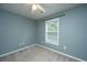 Carpeted bedroom with neutral paint and a bright window at 1629 Jorrington Street St, Mount Pleasant, SC 29466