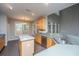 Eat-in kitchen featuring stainless steel appliances, an island, and hardwood floors at 1629 Jorrington Street St, Mount Pleasant, SC 29466