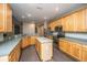 Well-lit kitchen features stainless steel appliances, an island, and ample counter space at 1629 Jorrington Street St, Mount Pleasant, SC 29466
