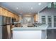 Eat-in kitchen with stainless steel appliances, an island, and hardwood floors at 1629 Jorrington Street St, Mount Pleasant, SC 29466