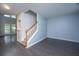 Inviting living space featuring hardwood floors, elegant wainscoting, and an open layout, creating a warm and welcoming atmosphere at 1629 Jorrington Street St, Mount Pleasant, SC 29466