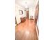 Welcoming foyer with wood floors and view of the door to the outside at 1807 Perch Rd, Moncks Corner, SC 29461