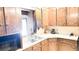 Cozy kitchen featuring wood cabinets, dual basin sink, and a microwave at 1807 Perch Rd, Moncks Corner, SC 29461