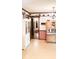 Vintage kitchen design with decorative wallpaper, cabinets, and flooring at 1807 Perch Rd, Moncks Corner, SC 29461