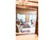 Charming living room view with wood-paneled walls and sliding doors at 1807 Perch Rd, Moncks Corner, SC 29461