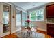 Cozy breakfast nook with bright windows providing ample natural light and views of the surrounding greenery at 1872 Staffwood Rd, Johns Island, SC 29455